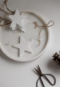 white homemade star shaped christmas decorations