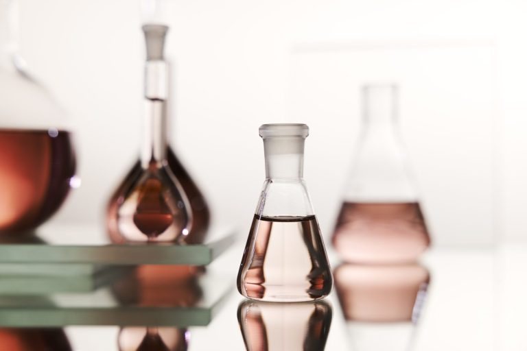 pink bottles in a science lab