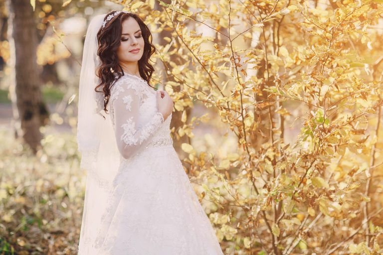 Beautiful bride in an autumn forest